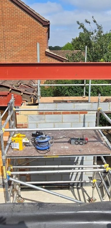 Red oxide primed steel beams cut to length – J.A.S Welding Services Norwich Red oxide primed steel beams cut to length – J.A.S Welding Services Norwich